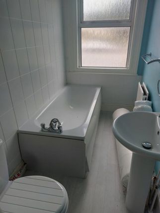 Bright And Functional Bathroom Featuring A Spaciou...