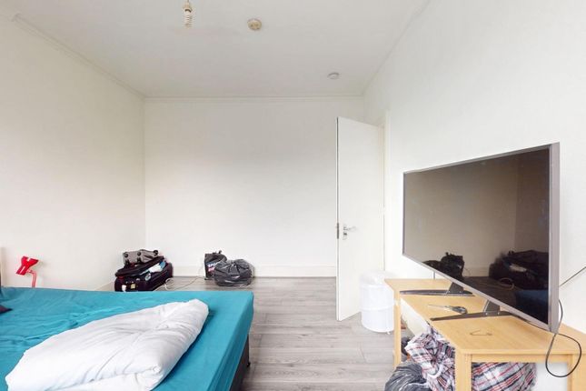 Bright And Spacious Master Bedroom Featuring A Com...