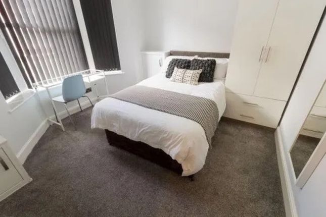 A Bright And Inviting Double Bedroom Featuring Mod...