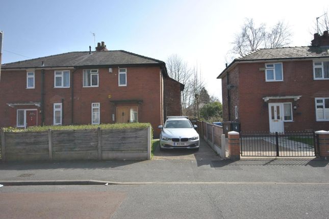 A Clear, Daylight View Of A Semi-Detached Brick Ho...