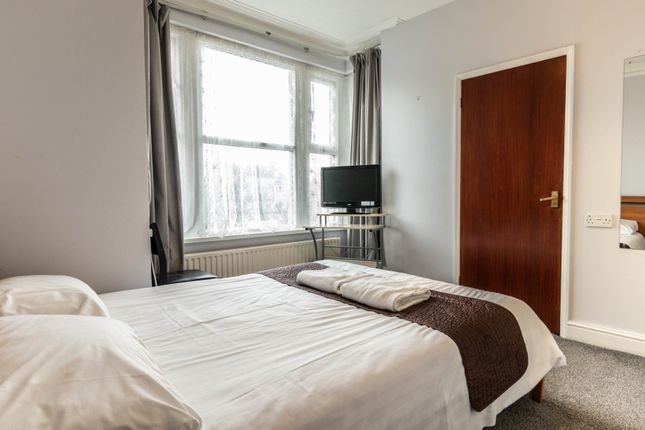 A Bright And Tidy Double Bedroom Featuring Large W...