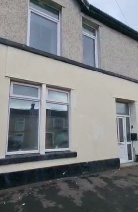 Exterior View Of A Traditional Terraced House Feat...