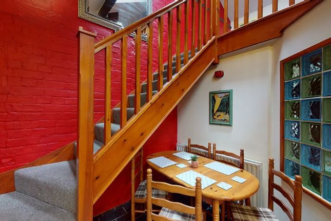 A Charming Staircase Leading To An Inviting Upper ...