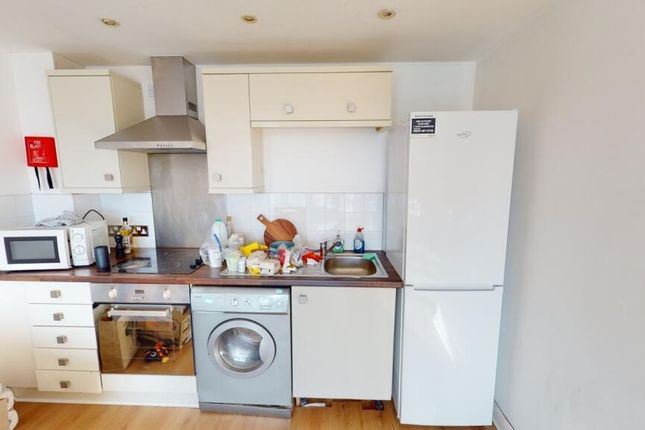 Bright And Tidy Kitchen Featuring Modern Appliance...