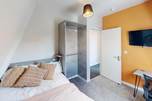 A Bright And Inviting Double Bedroom Featuring Mod...