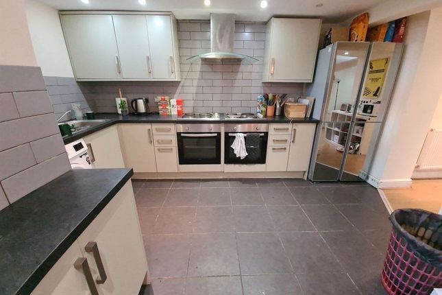 Modern And Well-Maintained Kitchen With Ample Cabi...