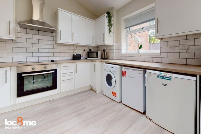 A Modern And Clean Kitchen With Ample Space And Na...