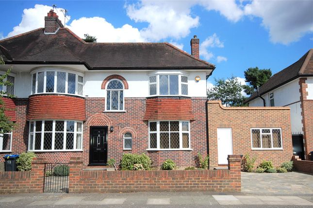 Detached house to rent in Burdett Avenue, West Wimbledon, London