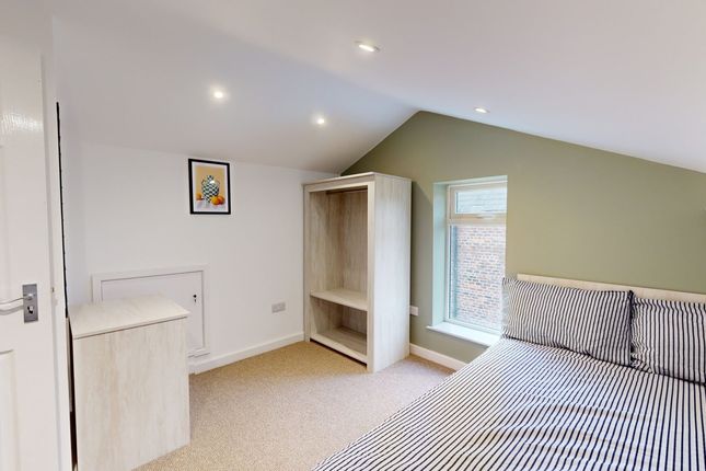 A Bright And Inviting Double Bedroom With Stylish ...