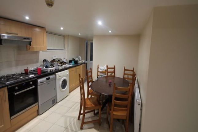 Bright And Modern Kitchen Area With Essential Appl...