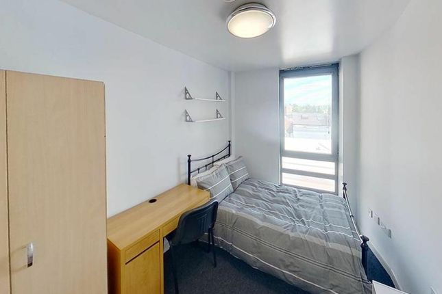 Bright And Inviting Double Bedroom Featuring A Com...