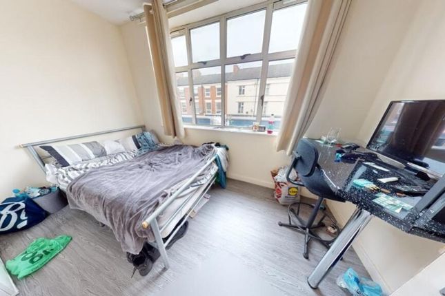Bright And Cozy Master Bedroom Featuring A Large W...