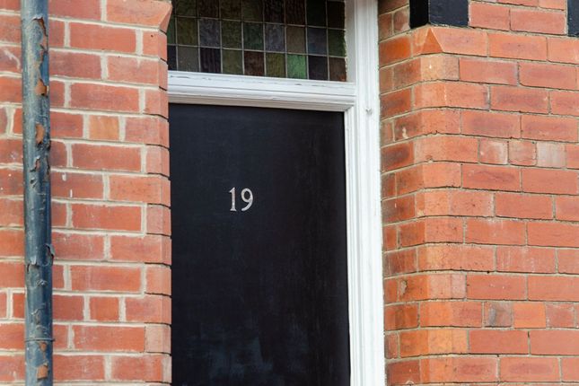Close-Up Of The Front Entrance Of A Charming Brick...