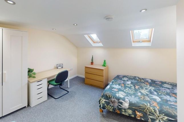 A Charming Double Bedroom Featuring Ample Storage ...