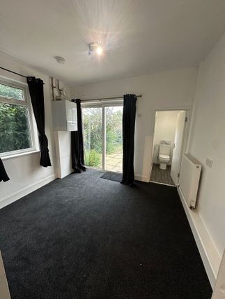 A Neat And Well-Maintained Small Room Featuring A ...