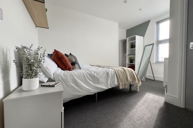 A Spacious And Inviting Double Bedroom Featuring m...