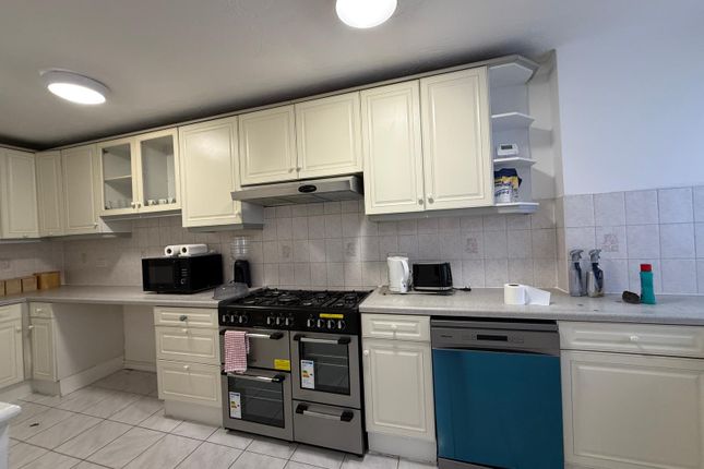 Spacious 6-Bedroom Home With Gardens, Driveway, And Multiple Living Areas