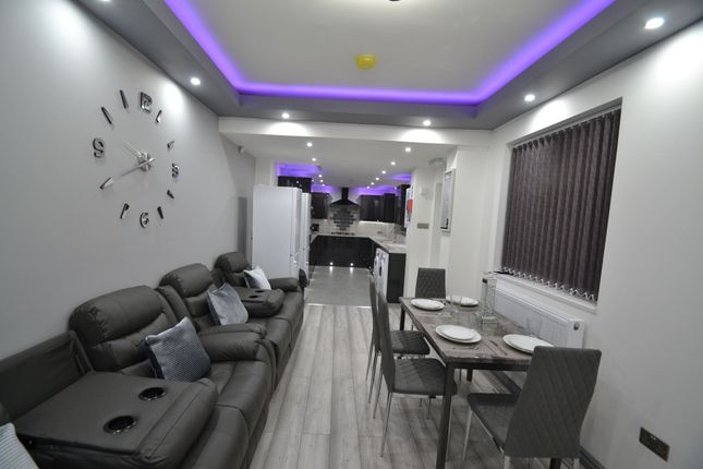 Modern, Well-Lit Living Room Featuring A Spacious ...