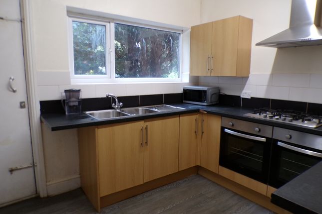 A Modern And Tidy Kitchenette With Ample Natural l...