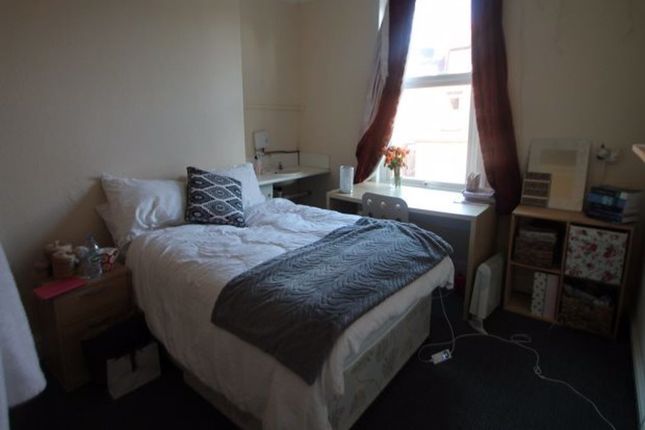 A Cozy Bedrooms With A Double Bed, Well-Lit By Nat...