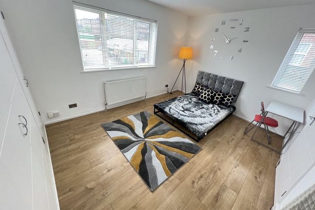 Bright And Modern Double Bedroom Featuring A Styli...