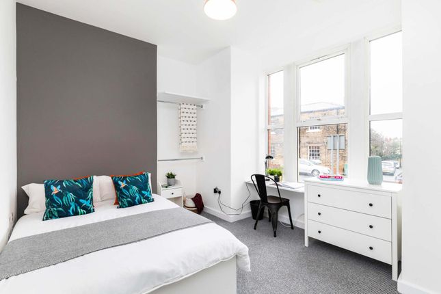 Bright And Inviting Double Bedroom With Large Wind...