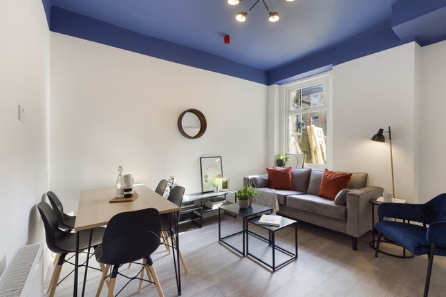 A Bright And Stylish Large Modern Living Room Perf...