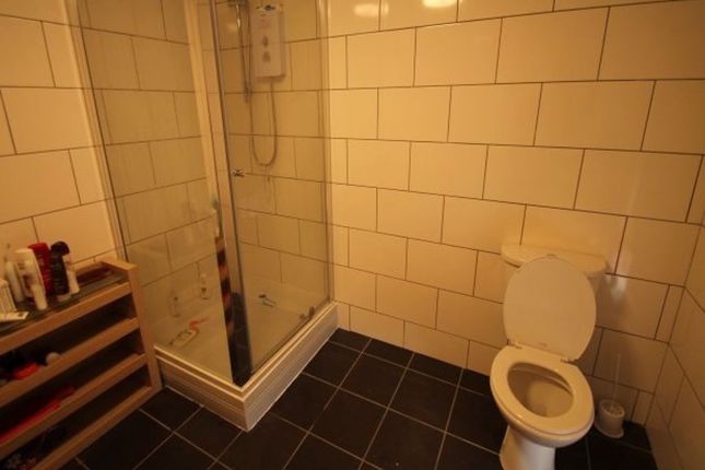 A Modern Bathroom Featuring A Large Shower Enclosu...