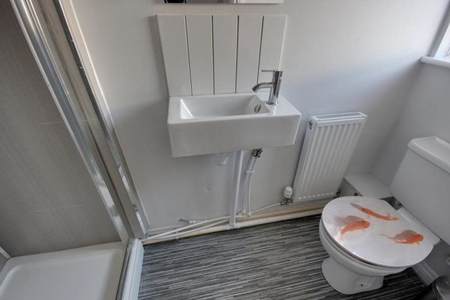 A Modern Bathroom Featuring A Sleek Design With A ...