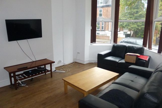 A Bright And Welcoming Contemporary Living Room Fe...