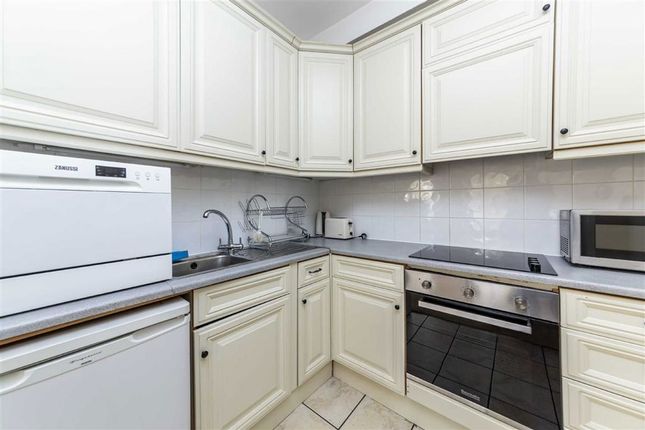 Flat 5, 63, Courtfield Gardens, London photo 4