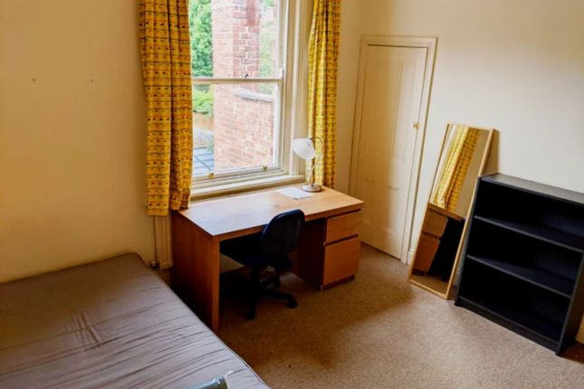A Bright And Inviting Double Bedroom Featuring A c...