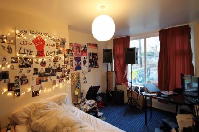 Cozy And Personalized Bedroom Corner With A Comfor...