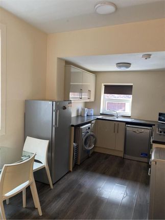 A Contemporary Kitchen Featuring Modern Appliances...