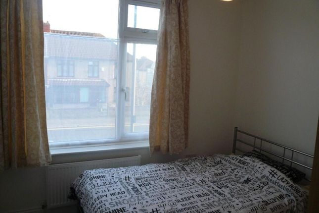A Bright And Inviting Double Bedroom Featuring Lar...