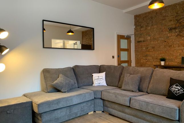 Modern And Stylish Living Room Featuring A Large, ...