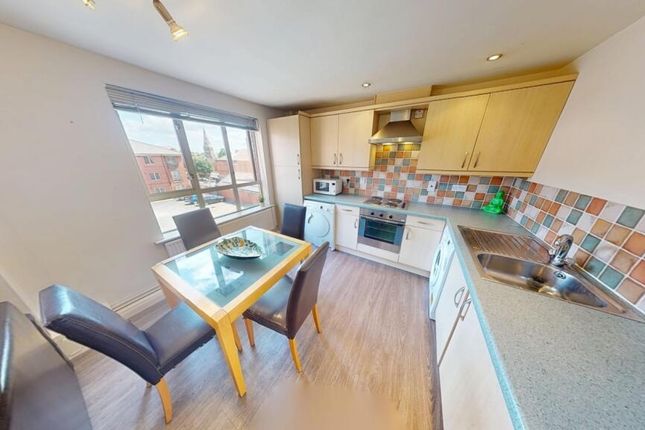 Bright And Modern Kitchen Featuring Tiled Backspla...