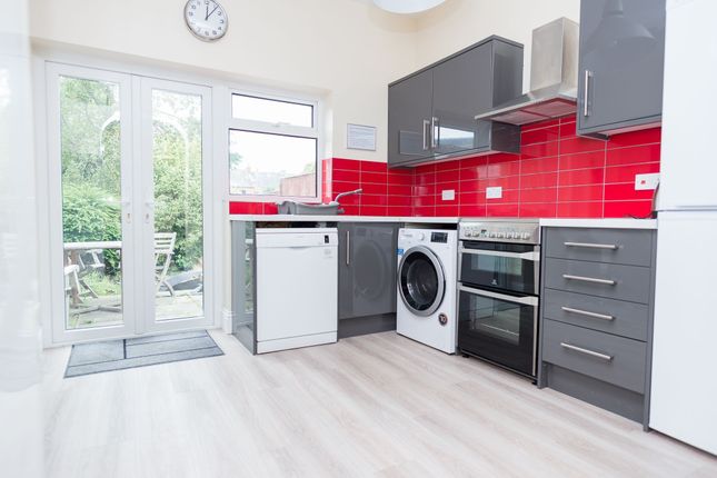Bright Modern Kitchen With Glossy Grey Cabinets, v...