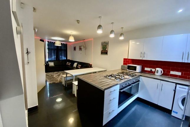 Bright, Open-Plan Living Space With A Modern Kitch...