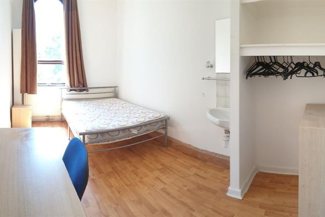 Bright And Tidy Single Bedroom Featuring A Large W...