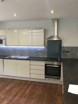 Modern Kitchen With Sleek White Cabinetry, Integra...