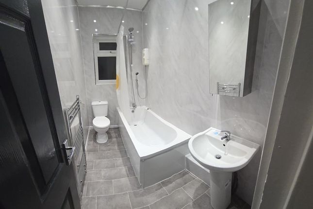Modern And Well-Maintained Bathroom Featuring A Ba...