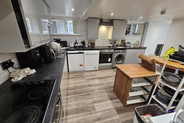 A Modern, Well-Maintained Kitchen Featuring A Spac...