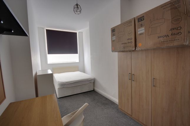 A Bright And Tidy Double Bedroom Featuring A Comfo...