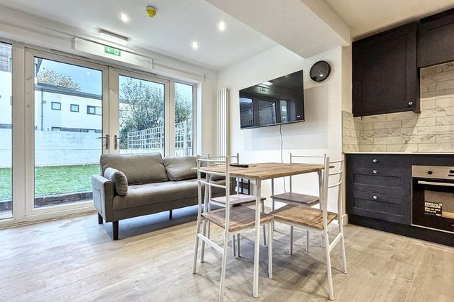 Bright Open-Plan Living Area With Full-Height Glas...