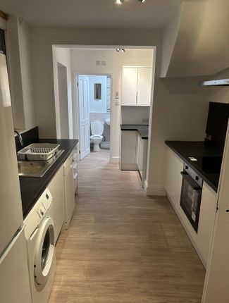 A Modern And Spacious Kitchen With Ample Natural l...