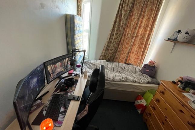A Cozy Double Bedroom Featuring A Comfortable Bed ...