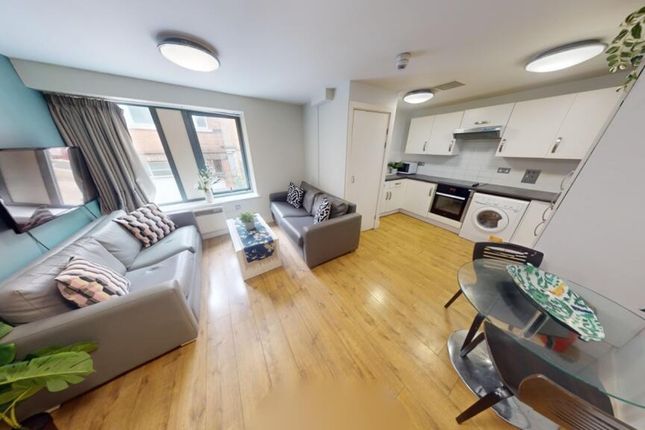 A Spacious And Inviting Large Modern Living Room W...