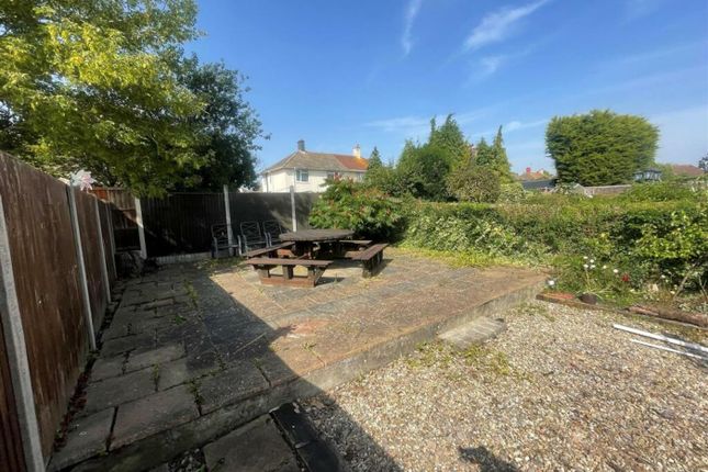A Spacious Garden Area With Seating And Well-Maint...