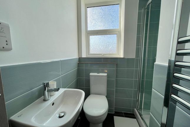 Modern Bathroom Featuring A Sleek Shower And Styli...
